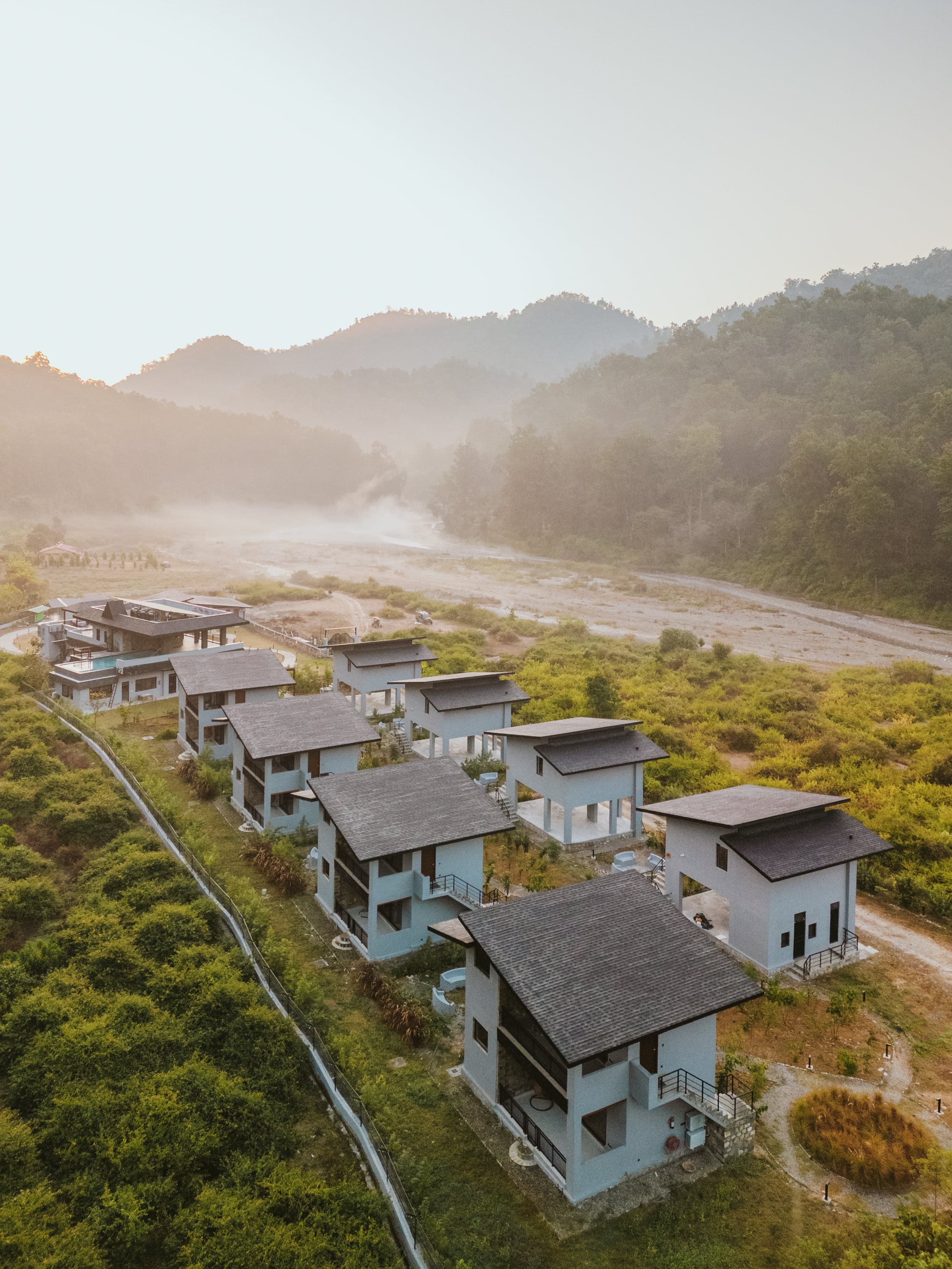 The Gaj Resort - Traditional building nestled in tropical foliage