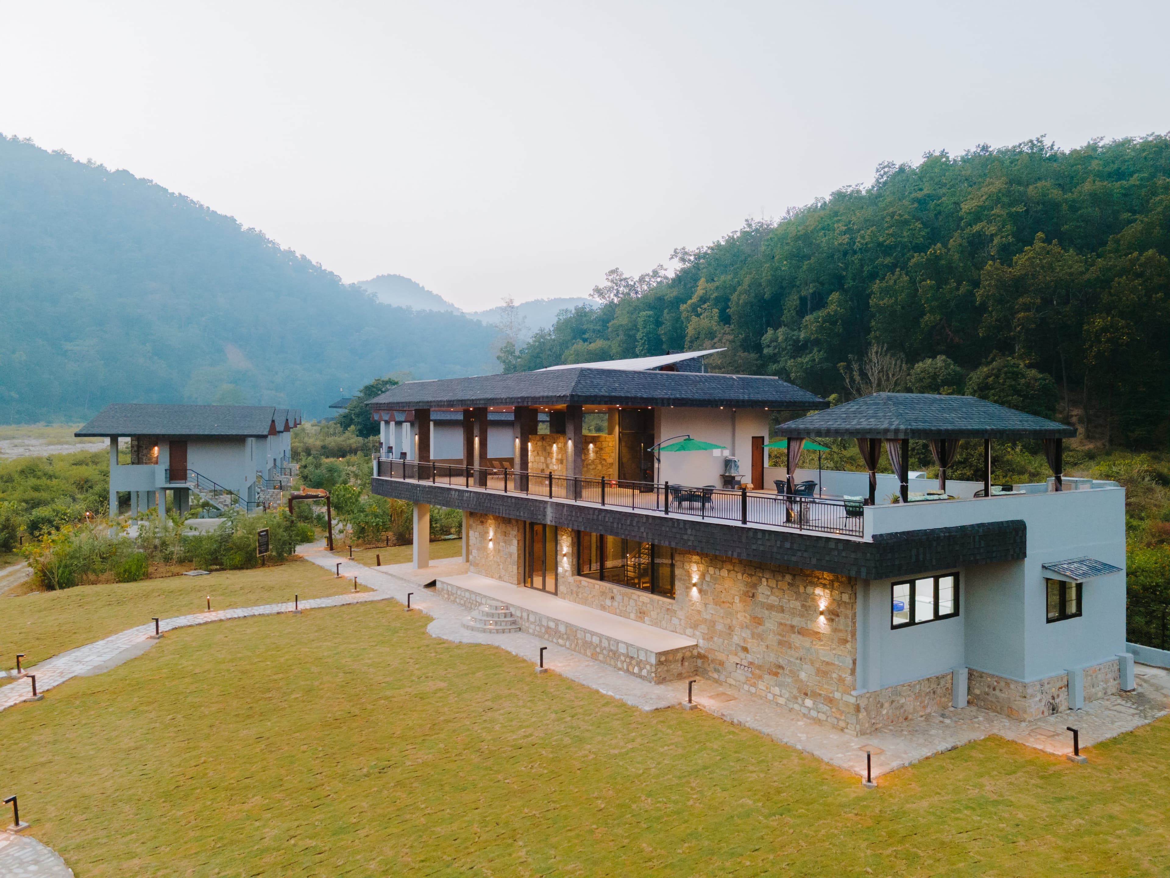 The Gaj Resort - Aerial view of the property nestled in mountains